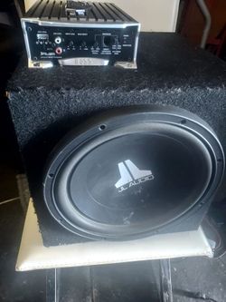 JL audio sub woofer with boss 1200 watt amp