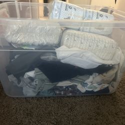 Bin Of Newborn& 0-3 Clothes And 3 Packs Of Newborn Diapers 