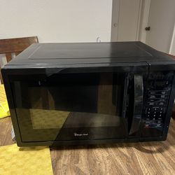 Magic Chef 1.1 cu. ft. Countertop Microwave Oven, in Black