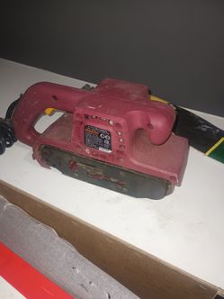 Sanding machine and sand paper