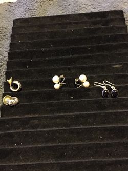 Three sets of sterling silver earrings