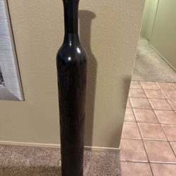 Tall, black engrave design vase