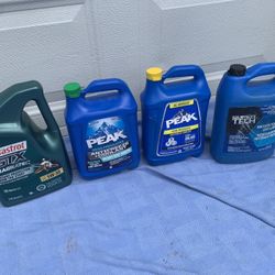 New, Sealed Container of Coolants & GTX MAGNATEC Motor Oil