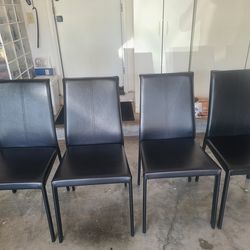 Set of 4 dining chair. Metal and leather