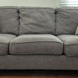 Medium Grey Couch And Throw Pillows
