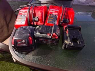 Milwaukee  2 chargers 3 Batteries
