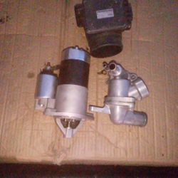 Starter, Thermostat Housing And Thermostat