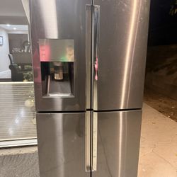 Greyish black samsung refrigerator