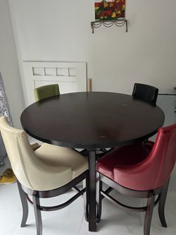 Dining Table with faux leather chairs