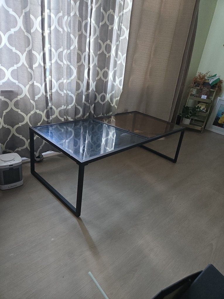 Rectangular glass and metal table
