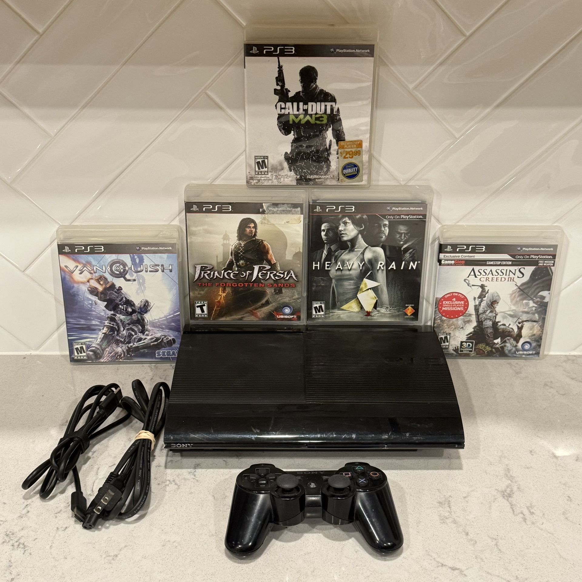 PS3 Super Slim 12 GB Console With 5 Games, Controller And cords