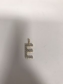 14 karat ladies diamond pendant letter E very elegant/ We do Layaway