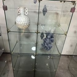Glass Display 2 door case, items inside not included see measurements below