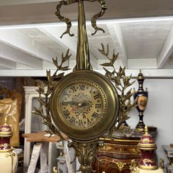 Gervais Bronze Clock:         - Description: This is a late 19th-century French Gervais bronze clock.          - Origin: Paris, France         - Time 