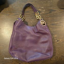 Michael Kors Fulton Large Shoulder Bag in a rich burgundy color