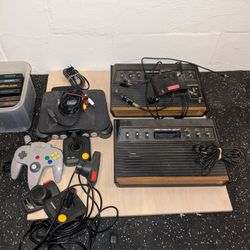 Nintendo 64 And 2 Atari's + Games