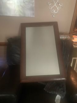 Brown framed knee head mirror (23x26)