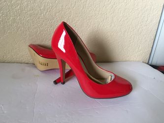 Pump red heels size 7