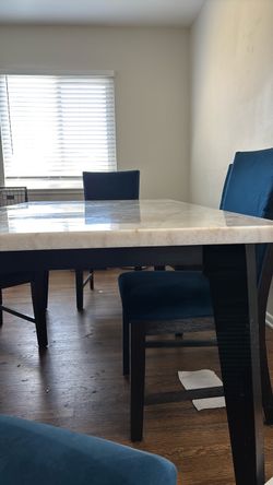 Marble Top Dining Table with Blue Chairs