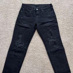 Black Ripped Levi’s jeans