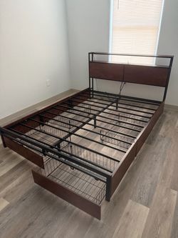 Queen size bed frame with hide away drawers