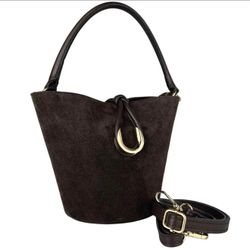 This Italian-made bag is crafted from genuine suede leather,