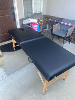 Massage table