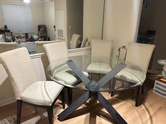 Glass top dining room table -4 chairs