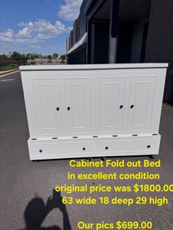 Bed Fold out Cabinet on wheelsWe are located at 2811 East Bell road. Another Time Around Furniture.