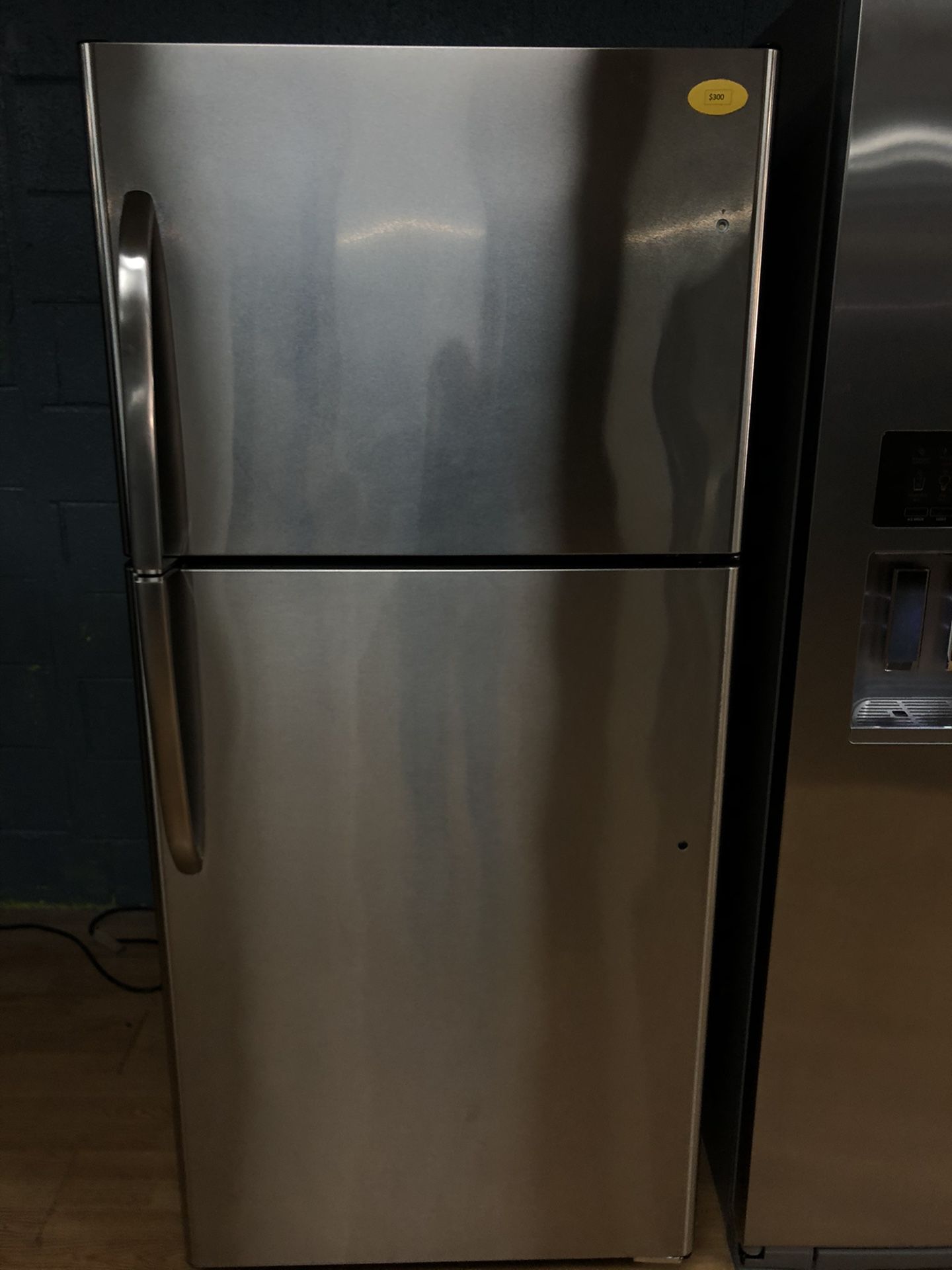 GE stainless steel top freezer refrigerator