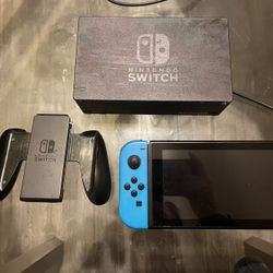 Nintendo Switch with Neon Blue and Neon Red Joy-Con