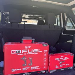 Milwaukee M18 Brushless FUEL Impact, Power Drill, Grinder And Impact Bit Set, X2 5.0 Batteries and Charger