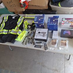 WHOLESALE ITEMS WITH FOLDING TABLE. READ DETAILS 