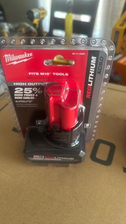 For sale Milwaukee battery and charger  and bag