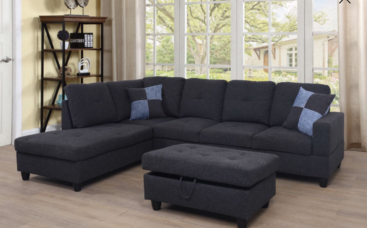 Black gray sectional couch with storage ottoman. Fabric linen