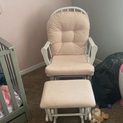 Nursery Rocking Chair and Changing Table Stroller Walking Assistant And Box Of Girls Clothes 