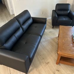 Anslee Black 76" Leather Sofa and Armchair