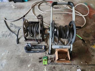 Two hose reels, three hoses with quick connects