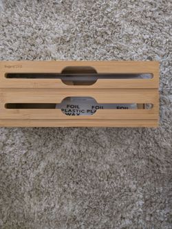 Foil plastic wrap dispenser