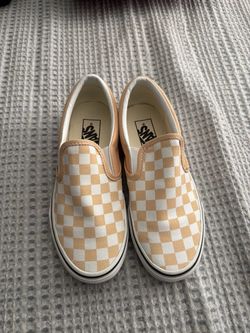 Yellow checker vans slip ons