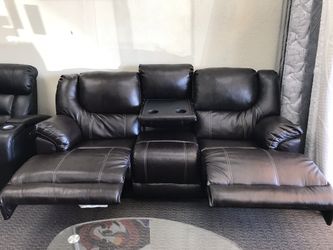 Sofa recliner with drop down table