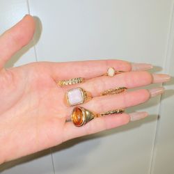 Including 12 rings, 3 bracelets, and 5 pairs of earrings, and two necklaces 