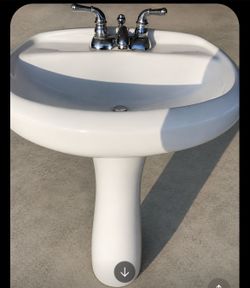White pedestal sink