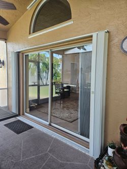 According Hurricane Shutter for patio sliding doors