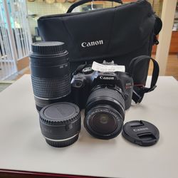Canon Rebel T7 with two lenses a battery and charger