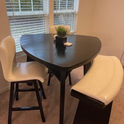 Contemporary Triangular Dark Wood Dining Table Set with Bench and white chairs