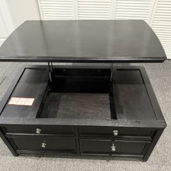 Coffee table that opens up 