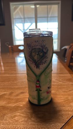 A custom made grinch cup