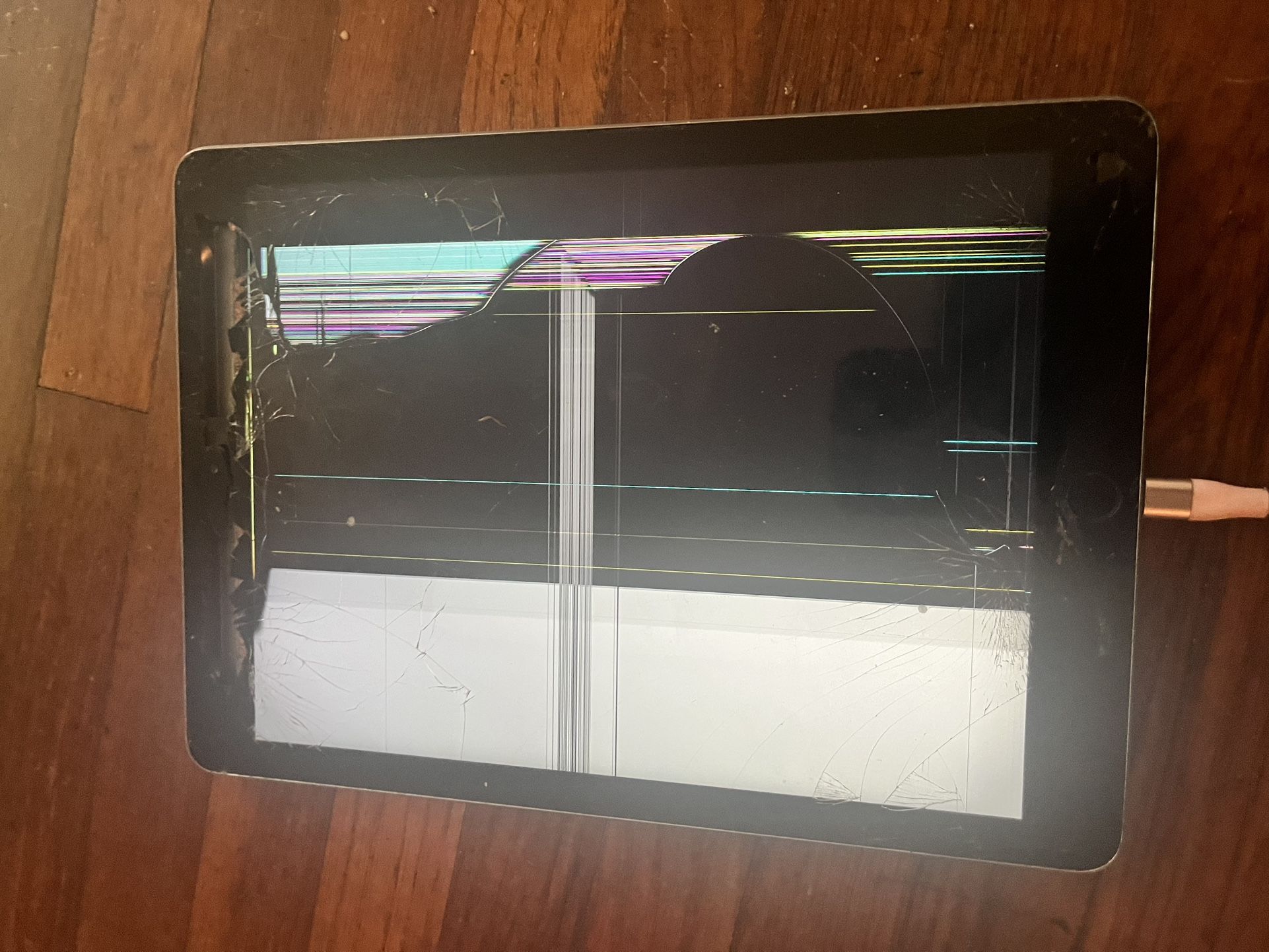 Two iPads With Broken Screens