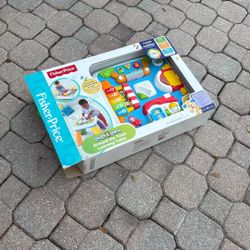 Fisher-Price Laugh & Learn Around the Town Learning Table Baby & Toddler Toy with Music & Lights